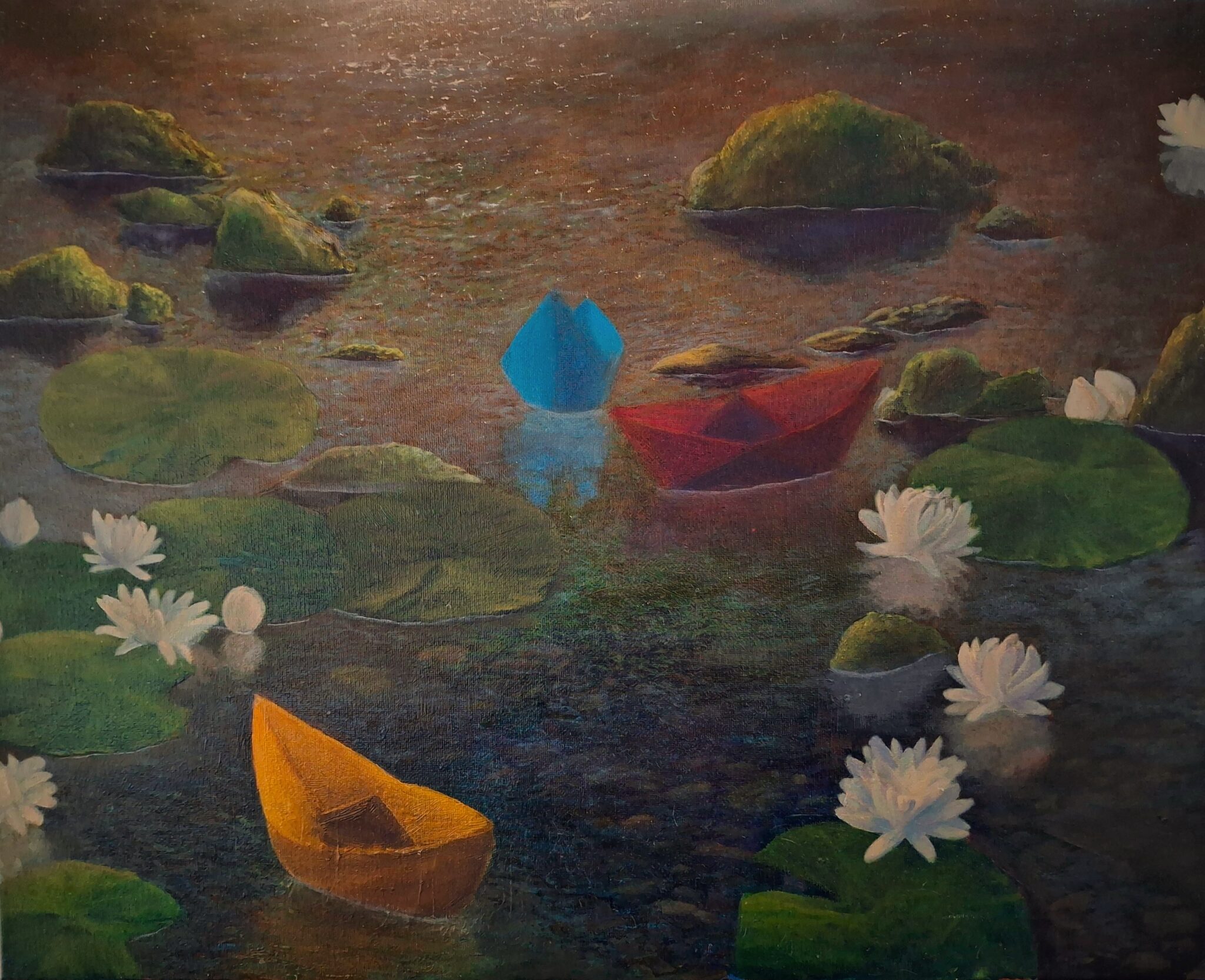 3 paper boats, blue, red, and yellow, float across shallow water during sunset. They are surrounded by rocks, lily pads, and flowers.